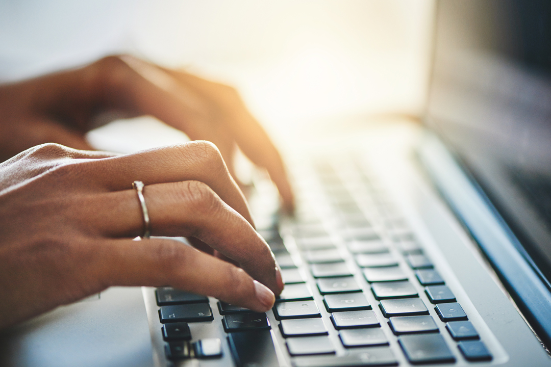 Participating provider woman typing on keyboard