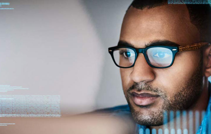 Man looking at computer screen